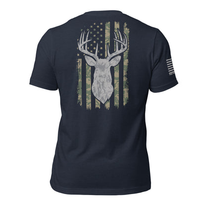 Men's Navy patriotic t-shirt featuring a deer Silhouette over a distressed American flag with a camouflage pattern. Perfect for hunters, veterans, and outdoor enthusiasts who love patriotic apparel made in the USA.